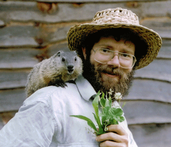 Doug Elliot Naturalist and Storyteller with ground hog on shoulder.