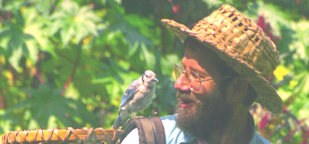 Doug Elliot Naturalist and Storyteller with ground hog on shoulder.