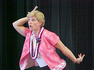 Elizabeth Rose telling stories at a school.  